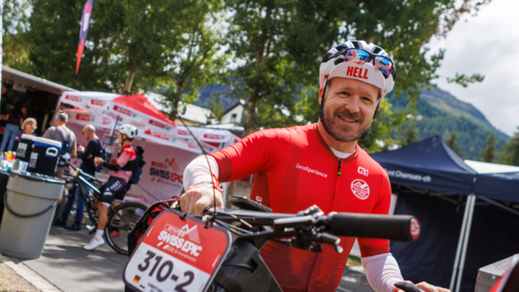 Rider at bike service at Swiss Epic