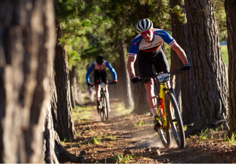 Two bikers in a forest path possibly Toit and Bontekoning