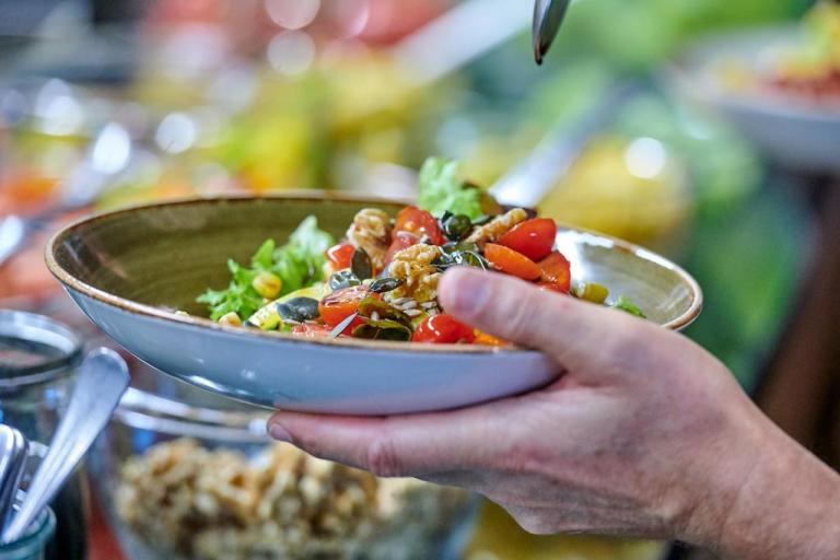 Close up on a food that looks like a really healthy salad