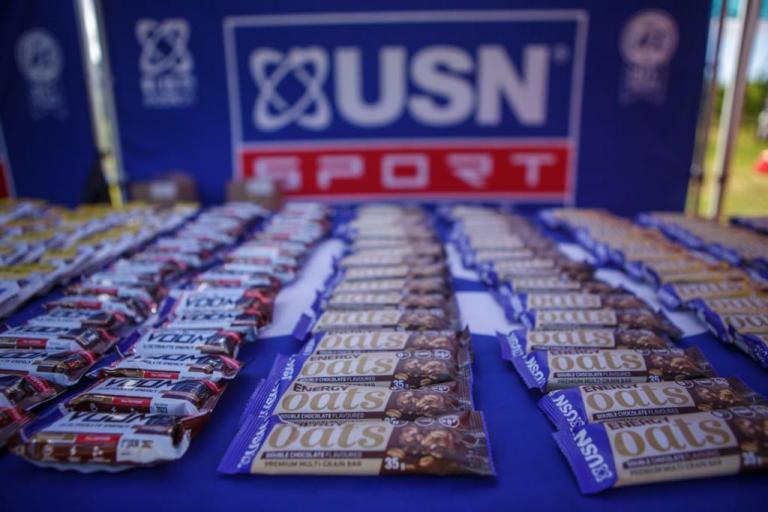 A close up of USN Sport granola and energy bars