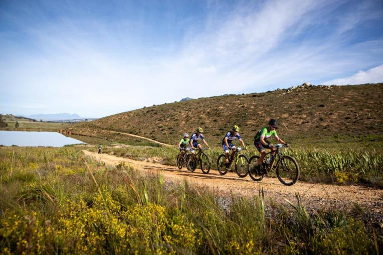 Smit and Burger biking on dirt