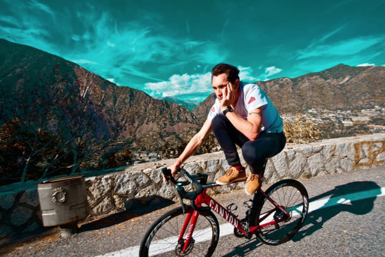 Willie "perching" on his bike 