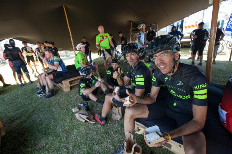 Bikers eating food post race
