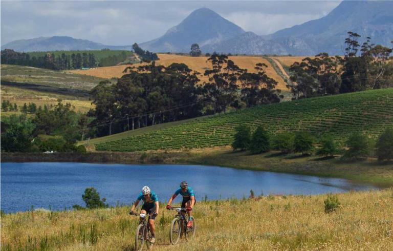 Two e bikers peddling through W2W