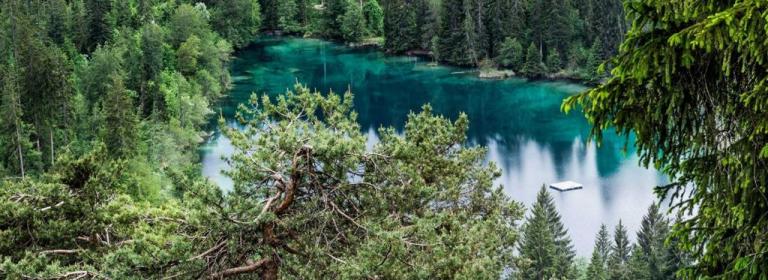 Crystal-clear water with a breathtaking mountain landscape