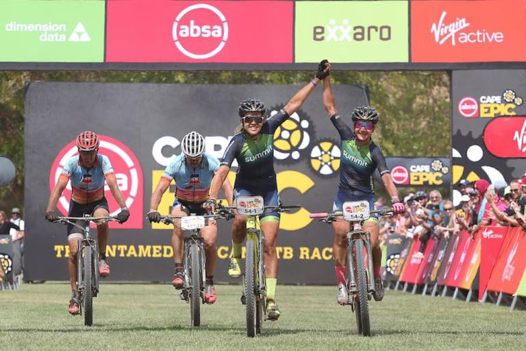 Beukes and Buys crossing the Absa Cape Epic finish line