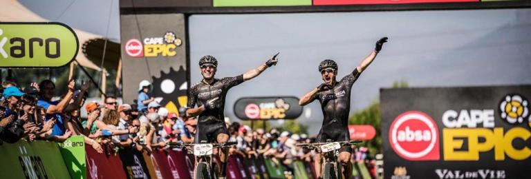 Orbea Factory team dabbing across the finish line of the Cape Epic