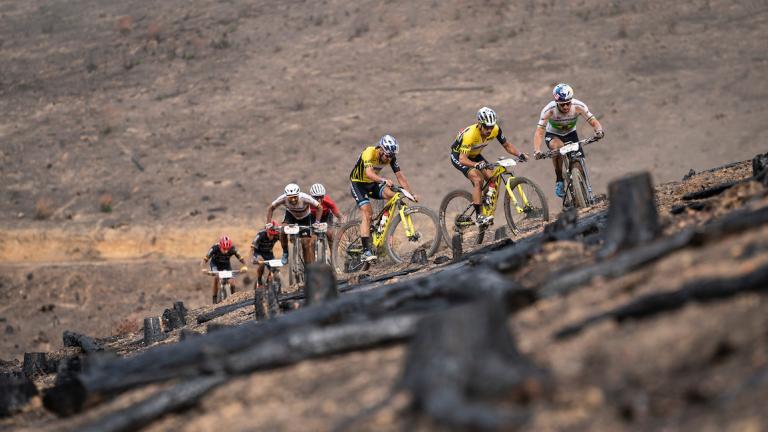 multiple bikers traversing a very bumpy hill [Epic Series]