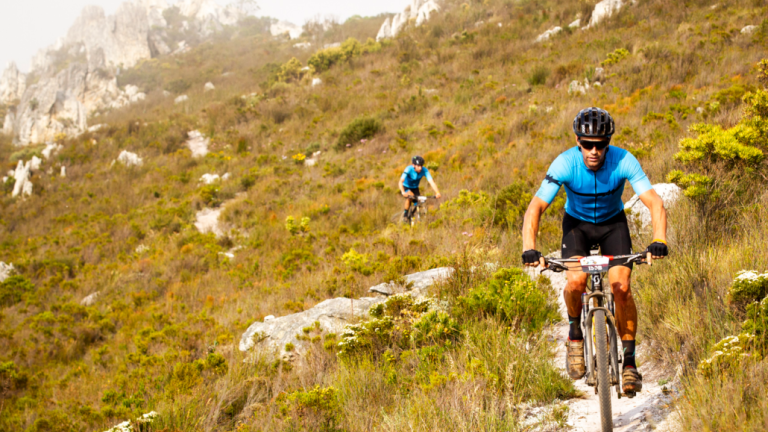 Two bikers in the Helderberg Mountains [FNB Wines2Whales]