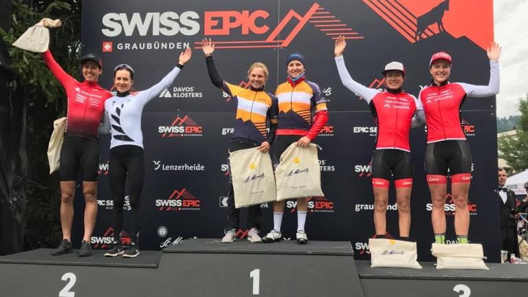 The winners platform of the Swiss Epic with Ariane Luthi on the 1st place platform [Swiss Epic]