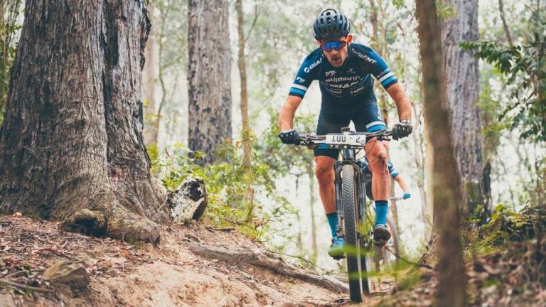 Jon Odams racing through the forest [Cape to Cape]