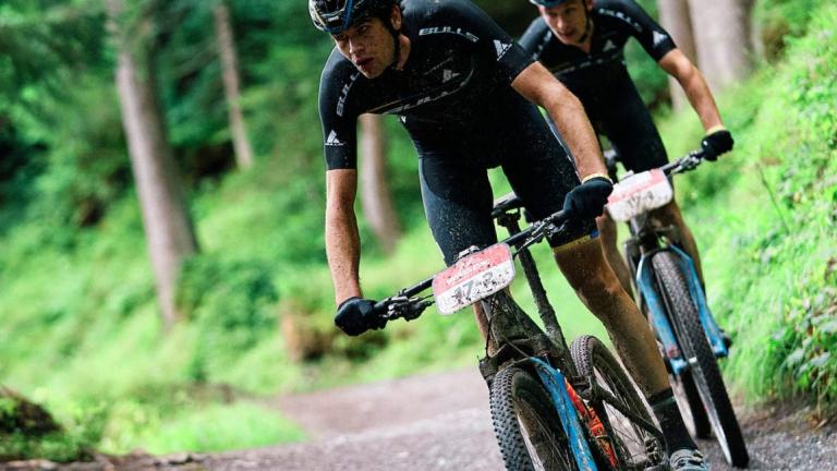 Close up of Team Bulls heading through a path [Andorra MTB Classic-Pyrenees]