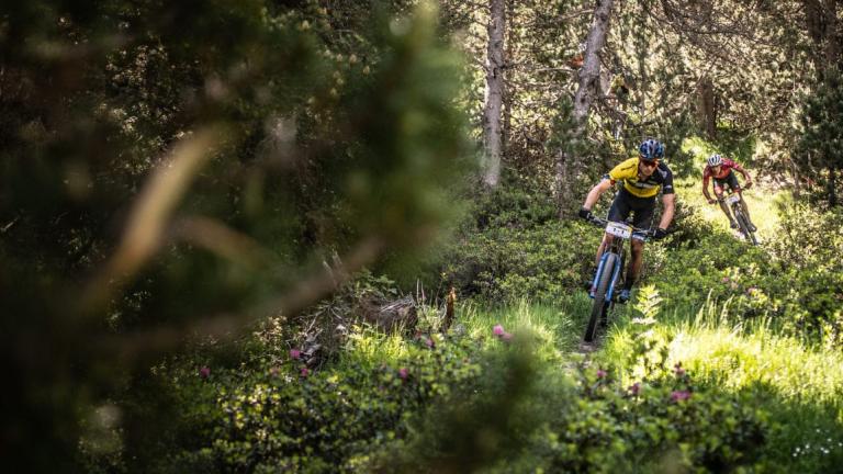 Two bikers in dense greenery [Andorra MTB Classic-Pyrenees]