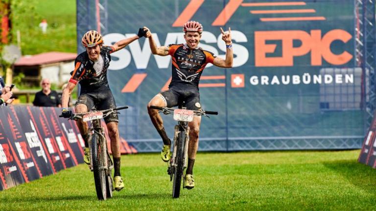 Casey South and Noah Blöchlinger crossing the finish line [Swiss Epic]