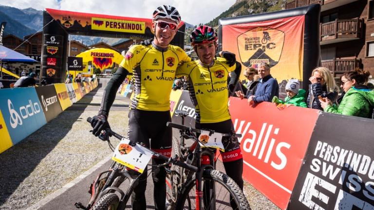 Geismayr and Käss  posing together at the end of the Perskindol Swiss Epic [Swiss Epic]