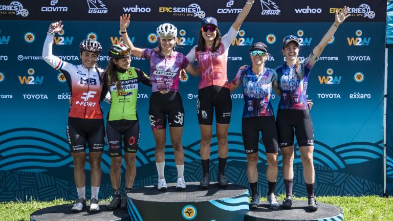 Elite women’s podium after Stage 1 of the 2025 FNB Wines2Whales Chardonnay (from left to right): Margot Moschetti, Claudia Peretti, Tyler Jacobs, Candice Lill, Robyn de Groot, and Sarah Hill. Photo by Dom Barnardt. 
