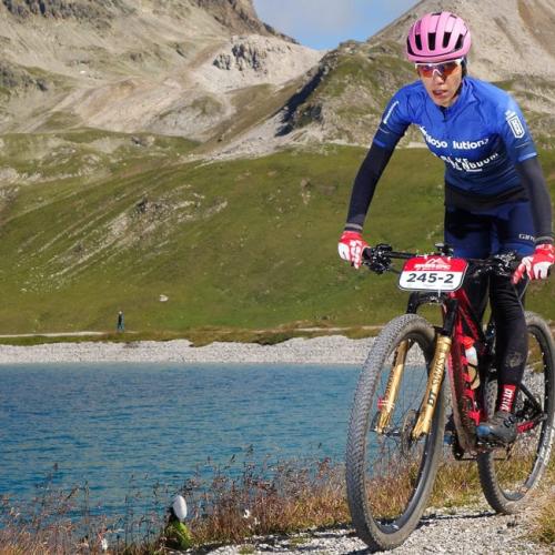 close up of Valenti Sanjuan biking on a path near a steep drop [Epic Series]