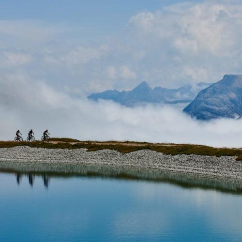 Four bikers on a foggy swiss epic ride [Swiss Epic]