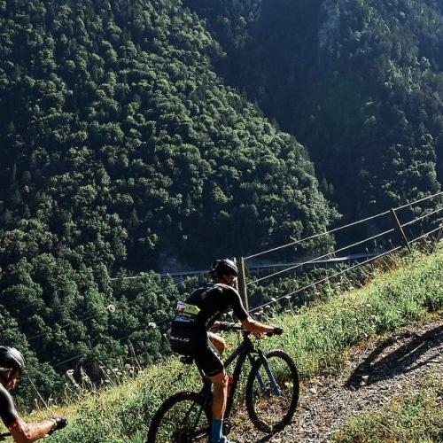A line of bikeres against the Andorra backdrop [Andorra MTB Classic-Pyrenees]