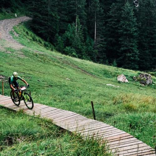 Two bikers heading across a bridge [Andorra MTB Classic-Pyrenees]