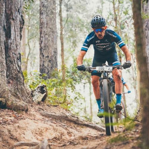 Jon Odams racing through the forest [Cape to Cape]