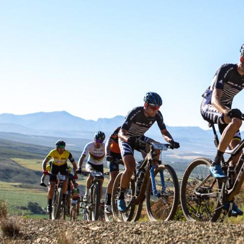 Angled shot of bikers heading up a mountain path [Epic Series]