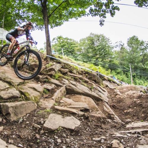 Haley Smith biking down rocks [Epic Series]