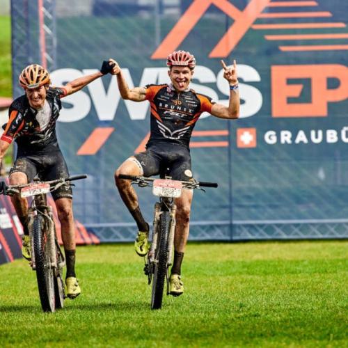 Casey South and Noah Blöchlinger crossing the finish line [Swiss Epic]