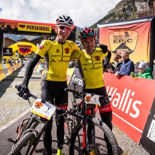 Geismayr and Käss  posing together at the end of the Perskindol Swiss Epic [Swiss Epic]